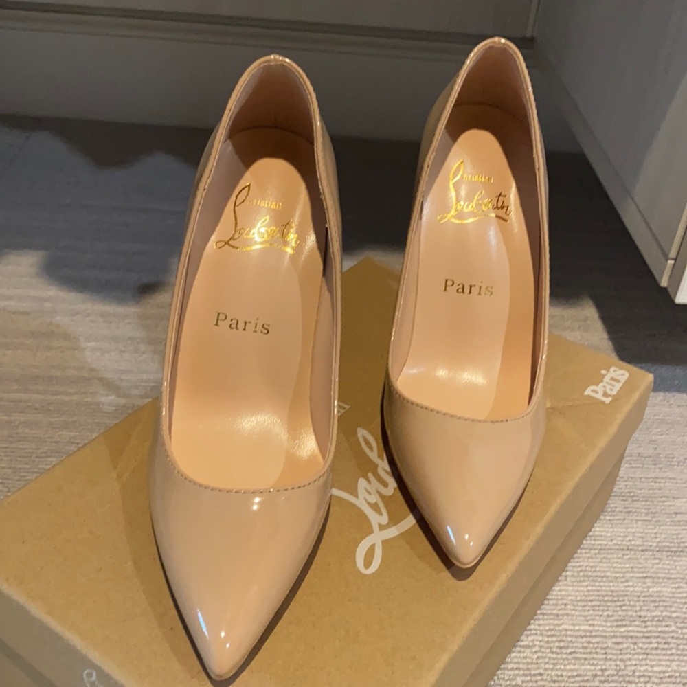 Brand new never worn patent leather heels.